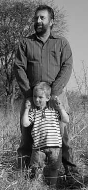 photo of father and son in the bush