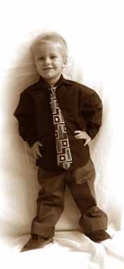 Photo of boy standing in studio
